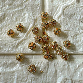 Gold rakhi balls